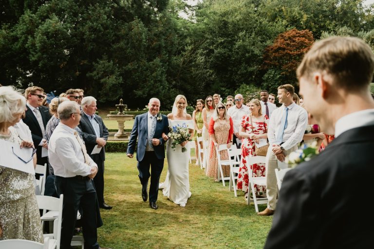 father walking bride ceremony garden Tinakilly Country House wedding Ireland WeddingWithMe