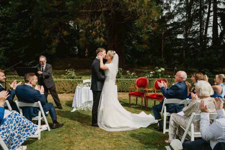 Elegant couple portraits at Tinakilly House wedding in Ireland with natural and timeless style. bride and groom first kiss after ceremony Tinakilly Country House wedding Ireland WeddingWithMe