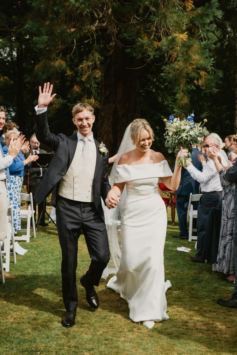 Intimate and emotional close-up of the bride and groom holding hands during the wedding ceremony at Tinakilly Country House in Ireland. This fine art wedding photograph captures the connection, love, and quiet intensity of the couple’s special moment. The soft natural light and elegant surroundings enhance the romantic atmosphere. Captured by WeddingWithMe, this image exemplifies professional wedding photography and videography, ideal for luxury wedding websites, galleries, and SEO-optimized content.