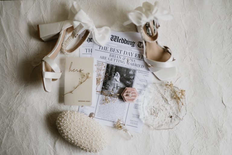 Wedding flat lay with rings, bridal shoes and wedding invitations at Ballykealey House captured by WeddingWithMe in Ireland